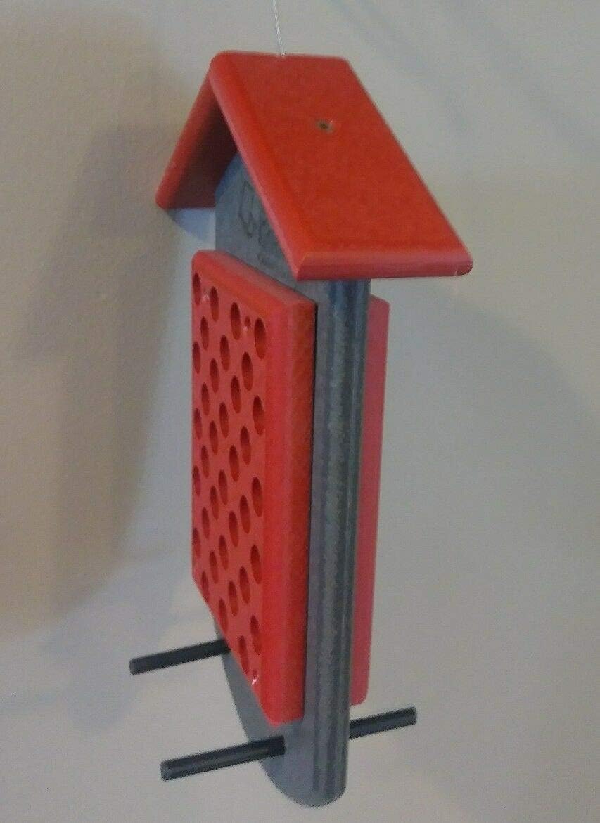 side view of peanut butter bird feeder red/grey